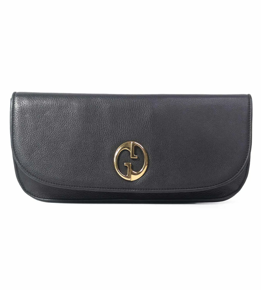 Pre-Loved Gucci Leather 1973 Flap Clutch – Shop This Elegant Pre-Owned Designer Bag Today!