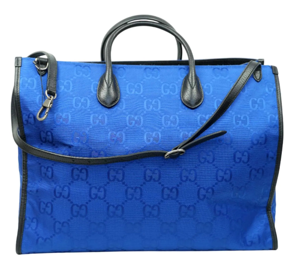 minimal Gucci blue nylon tote bag with GG pattern and structured design