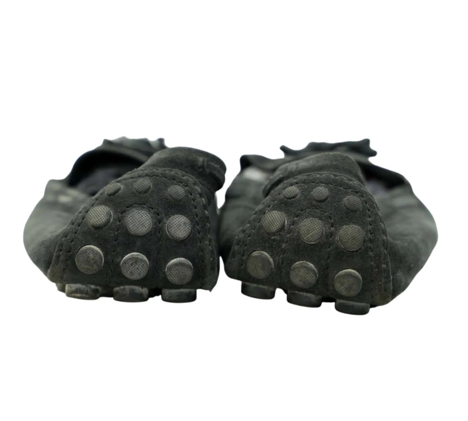 editorial style Louis Vuitton black suede loafers with tassel detail styled with formal outfit