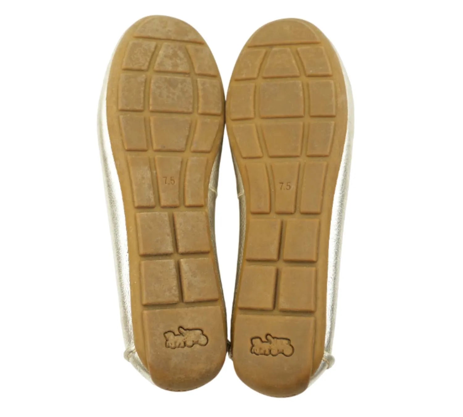 editorial style Coach champagne loafers styled with casual outfit
