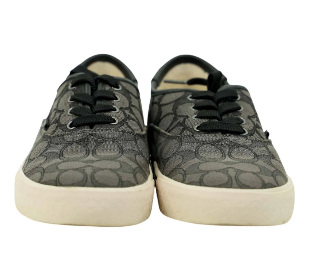 trending Coach charcoal black sneakers with signature print, skate-inspired luxury footwear