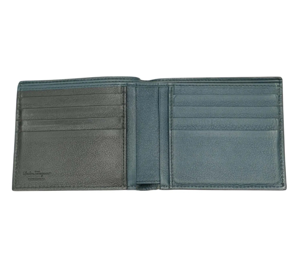 editorial style Ferragamo textured bifold wallet styled with modern accessories
