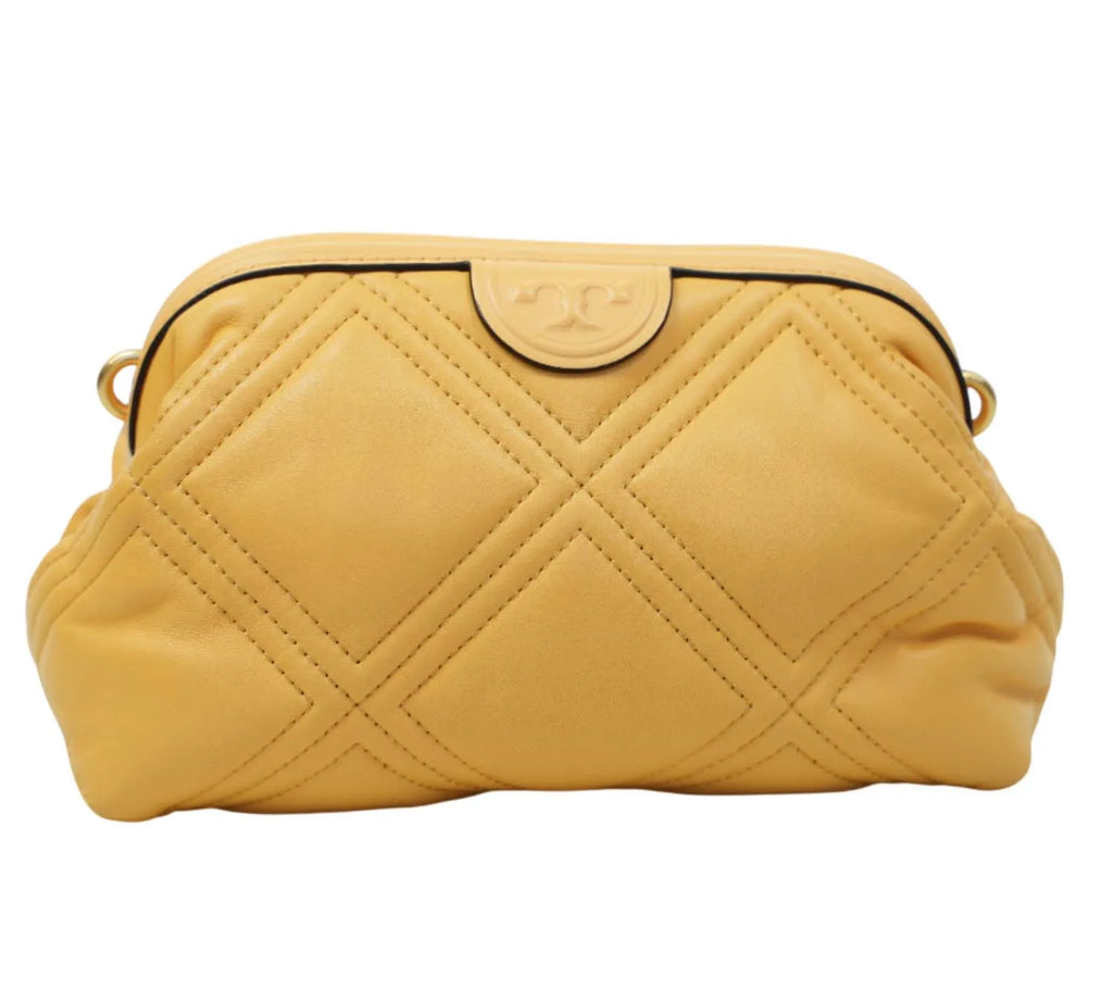 minimal Tory Burch crossbody bag with quilted leather and soft frame silhouette