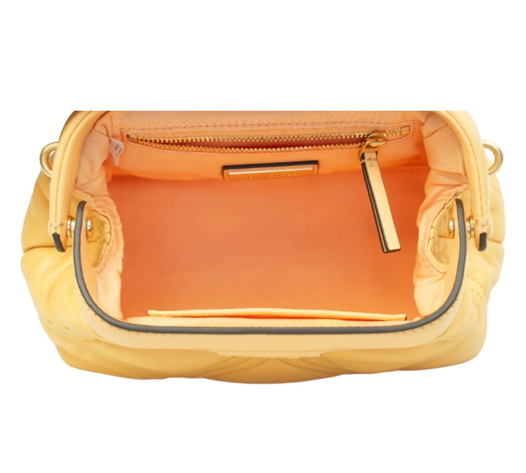 Tory Burch Fleming crossbody bag styled with casual and dressy outfits
