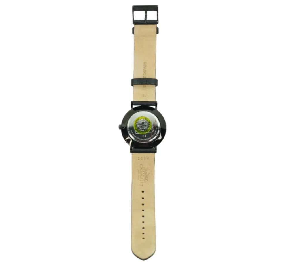 editorial styled Coach Perry black leather watch paired with modern outfit