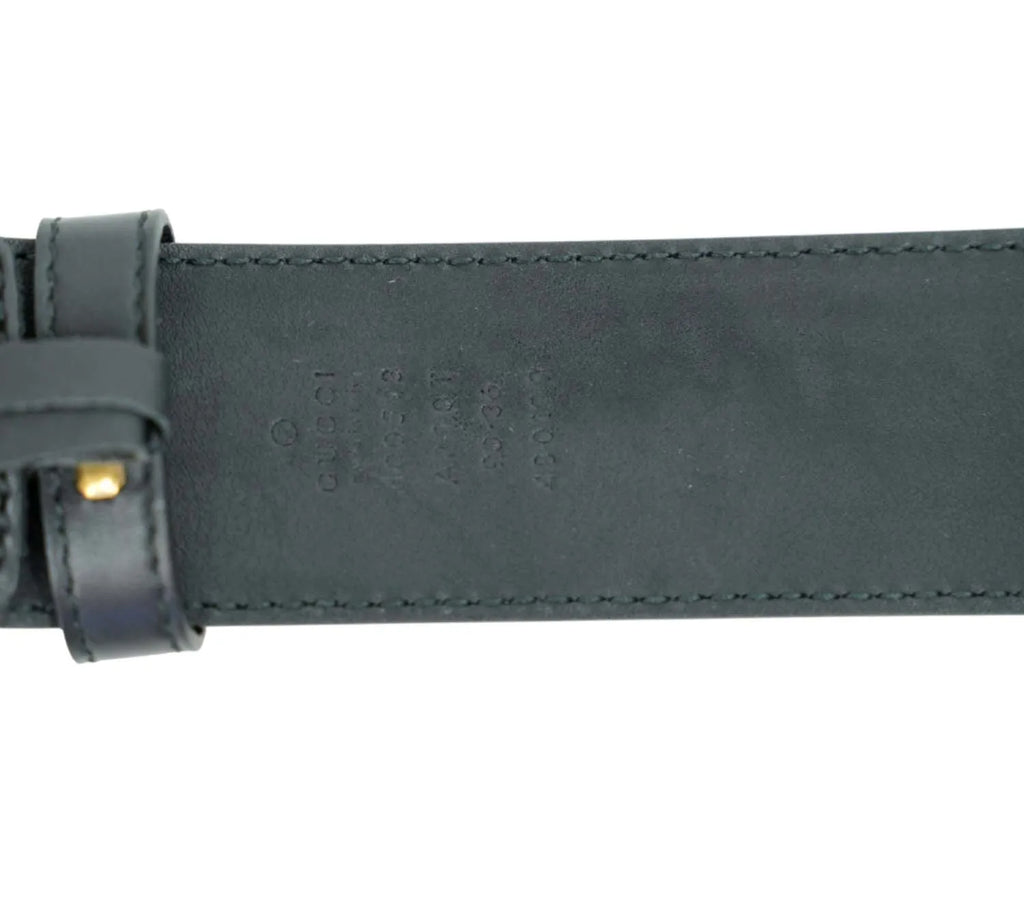 close-up Gucci GG Marmont belt showing double G buckle and leather texture