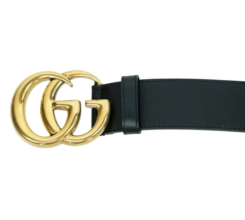 Gucci black GG Marmont belt styled with dresses and jeans outfits