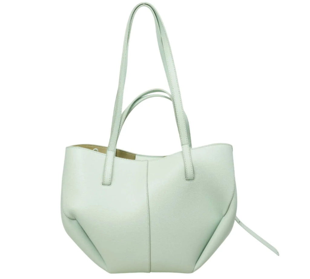 trending Polène Cyme mini bag in sea foam color with modern sculptural design