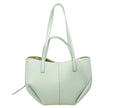 Polène Cyme Mini bag in textured sea foam color with sculptural silhouette and premium leather