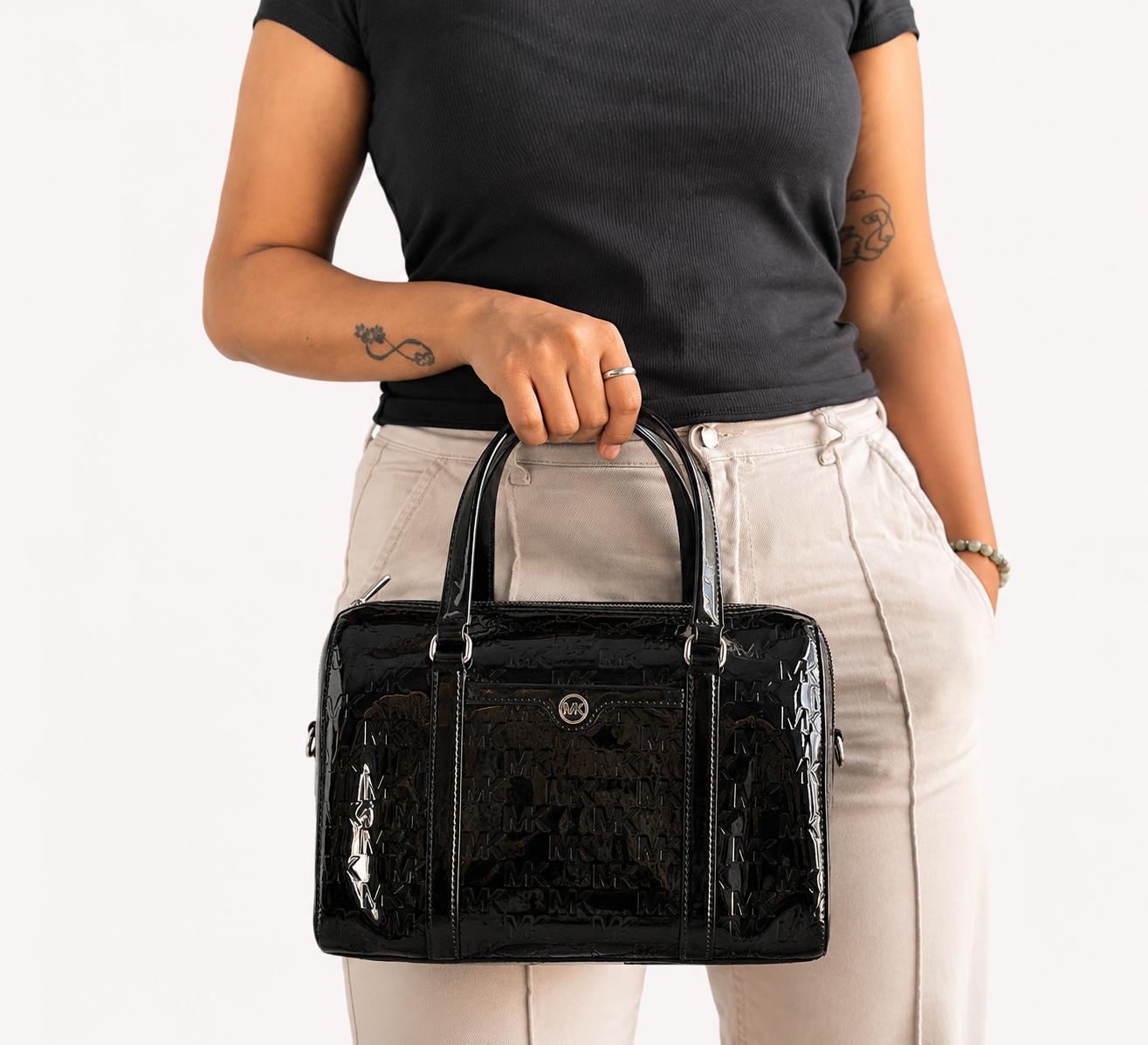 Jet Set Medium Black Patent Logo Debossed Duffel Satchel